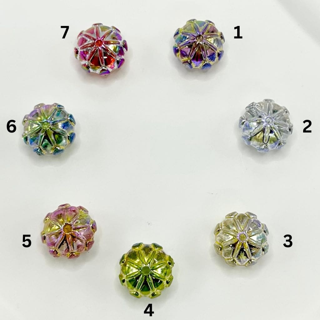 Colorful crystal buttons on a white background