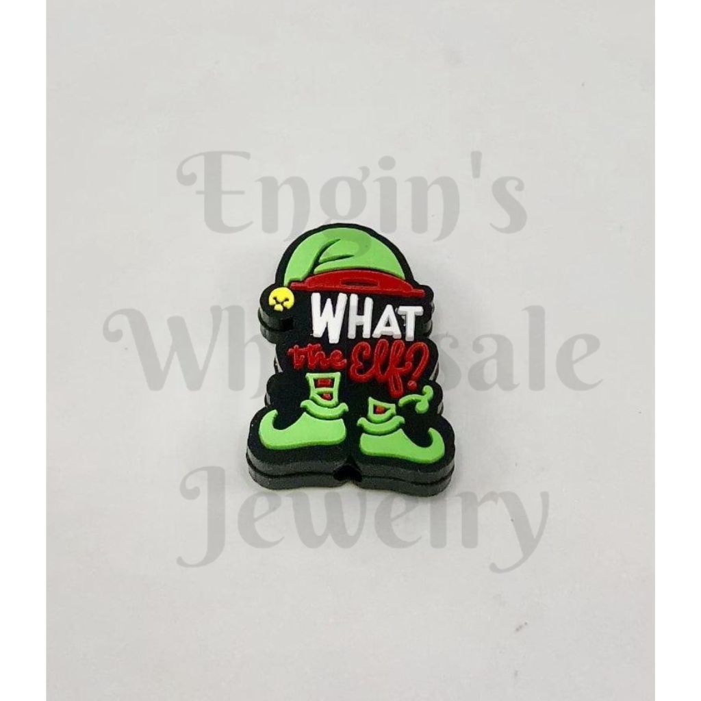 Christmas-themed decorative item with text 'What the Elf?' on a white background