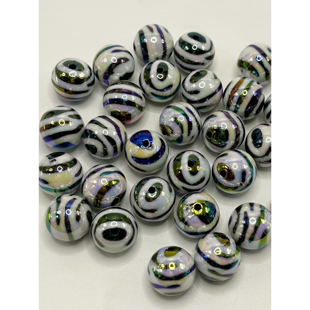 Assorted multicolored beads on a white background