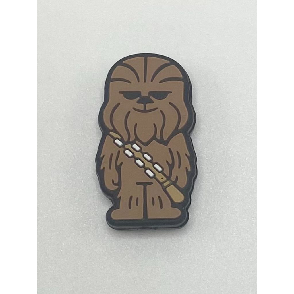 A silicone bead featuring a cartoon depiction of Chewbacca from Star Wars.