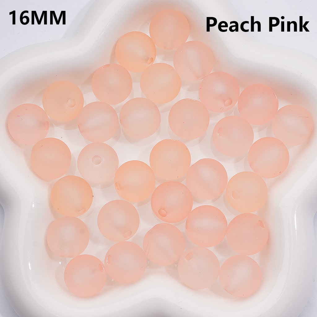 16MM peach pink beads on a white background