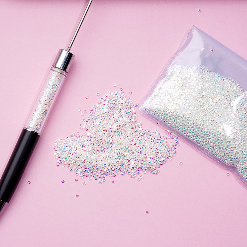 Tiny clear crystal rhinestones confetti, perfect for DIY crafts, jewelry making, and decoration projects