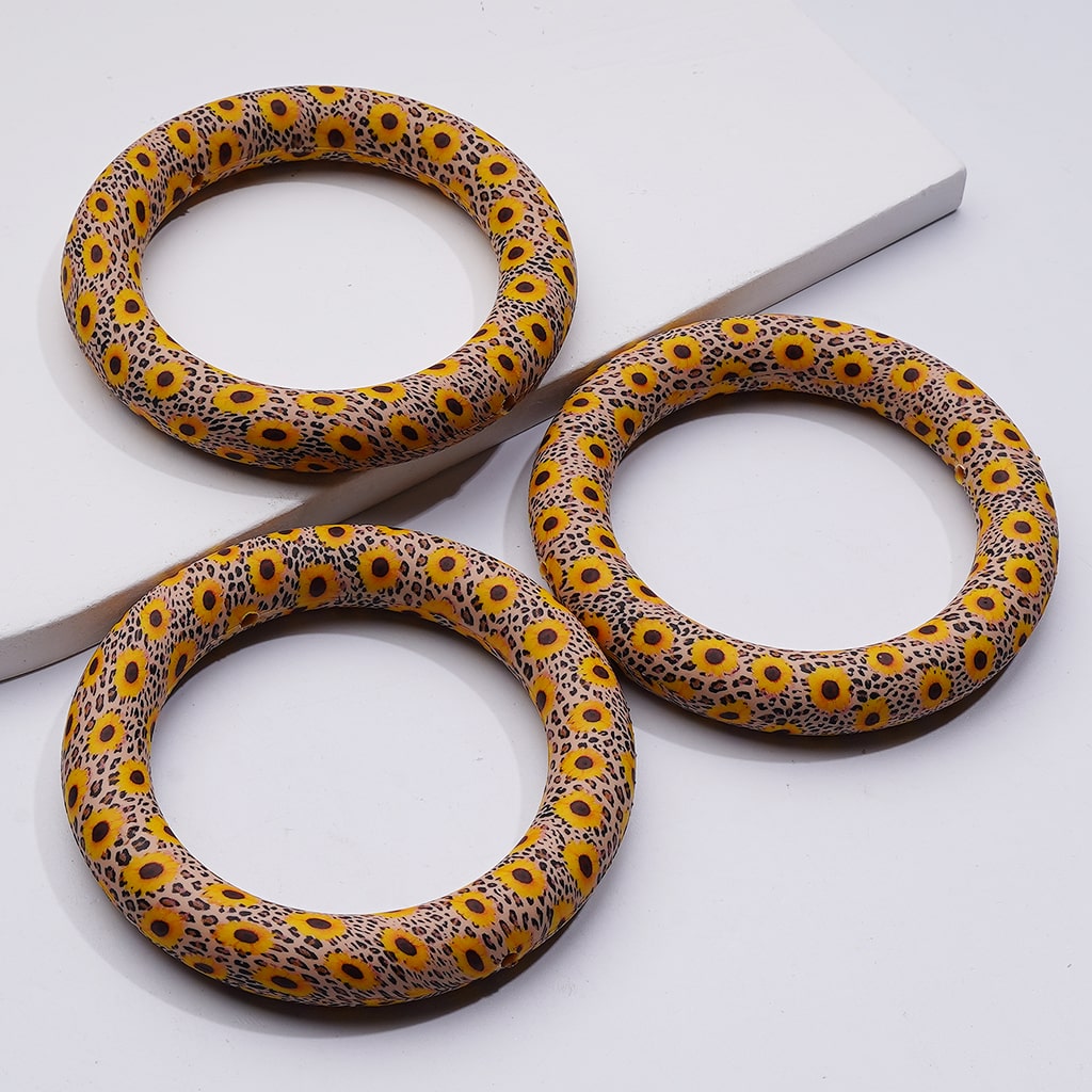 Cute Sun Flower Jaguar Prints Silicone Ring Frame Bead Circle Round Soft Car Hanger Charm Loop 65mm