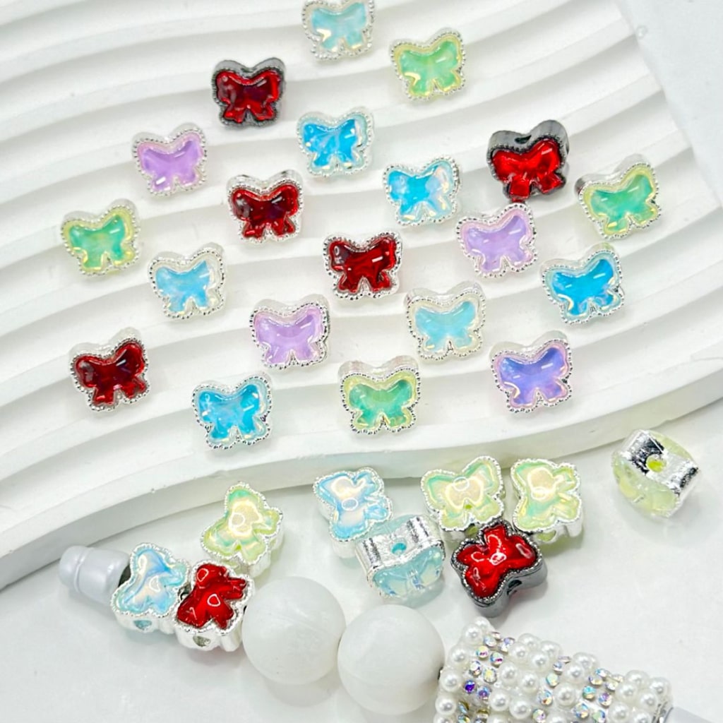 絶妙なシルバー&ガンブラック合金の蝶結びビーズ、光沢のある蝶結びラインストーン付き、約12×10mm