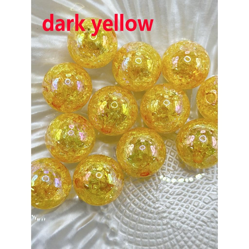 Dark yellow beads on a textured white surface with 'dark yellow' text above.