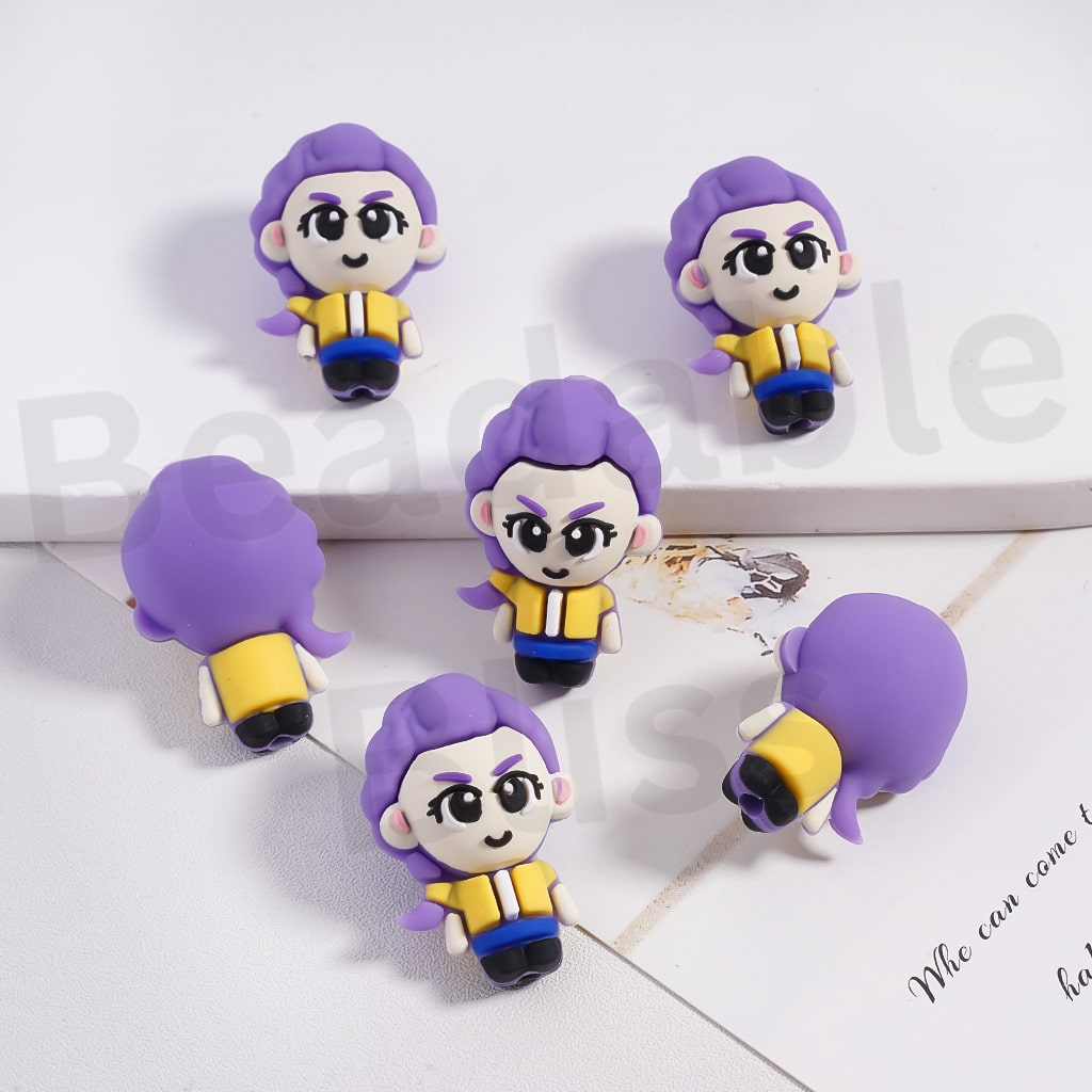 Set of purple and yellow character figurines on a white surface with 'beadablebliss' branding.