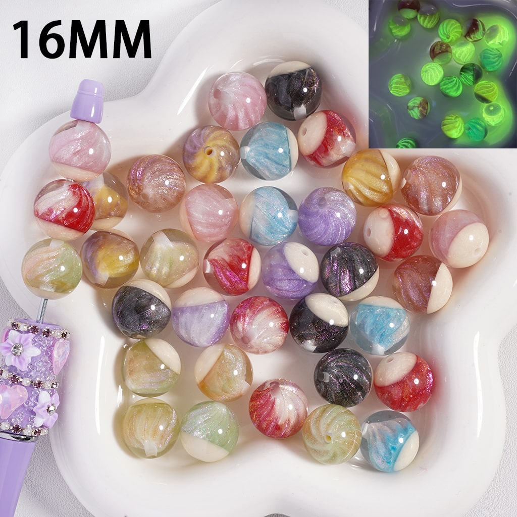 Colorful marbled beads on a white dish with a close-up of glowing green beads.