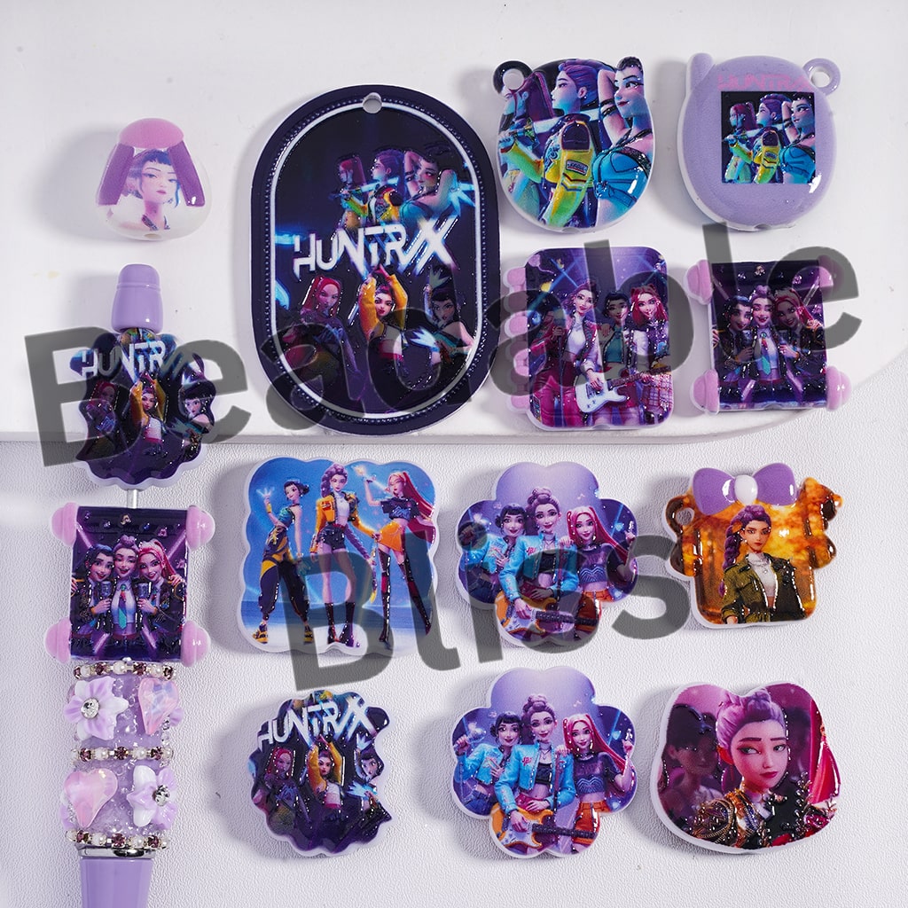 Collection of Huntix-themed accessories including phone cases and hair clips on a white background.