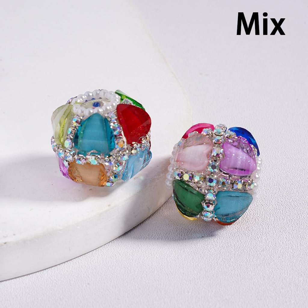 Colorful glass beads on a white surface with 'Mix' text above.