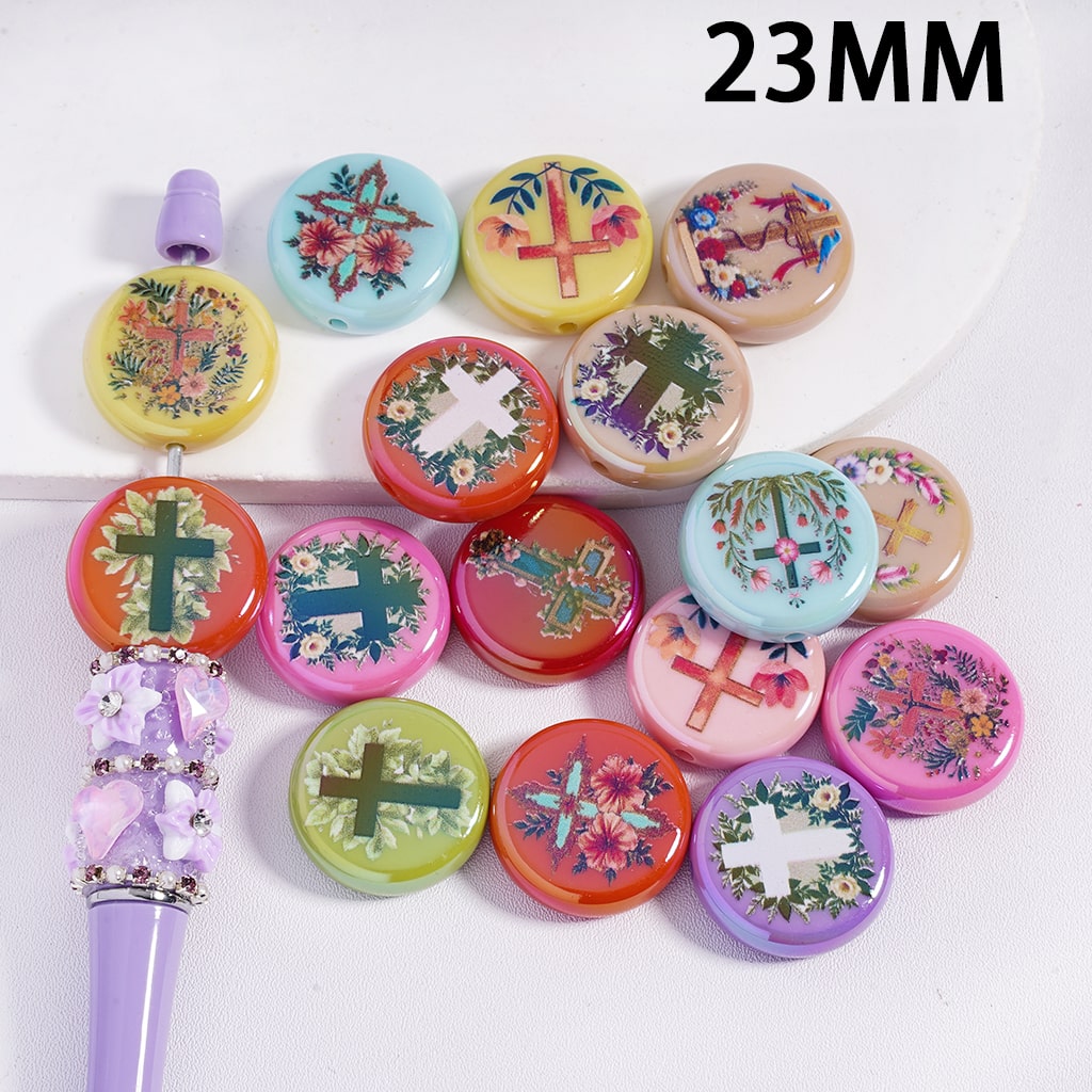 Colorful decorative buttons with floral and cross designs on a white background, with a 23MM label.