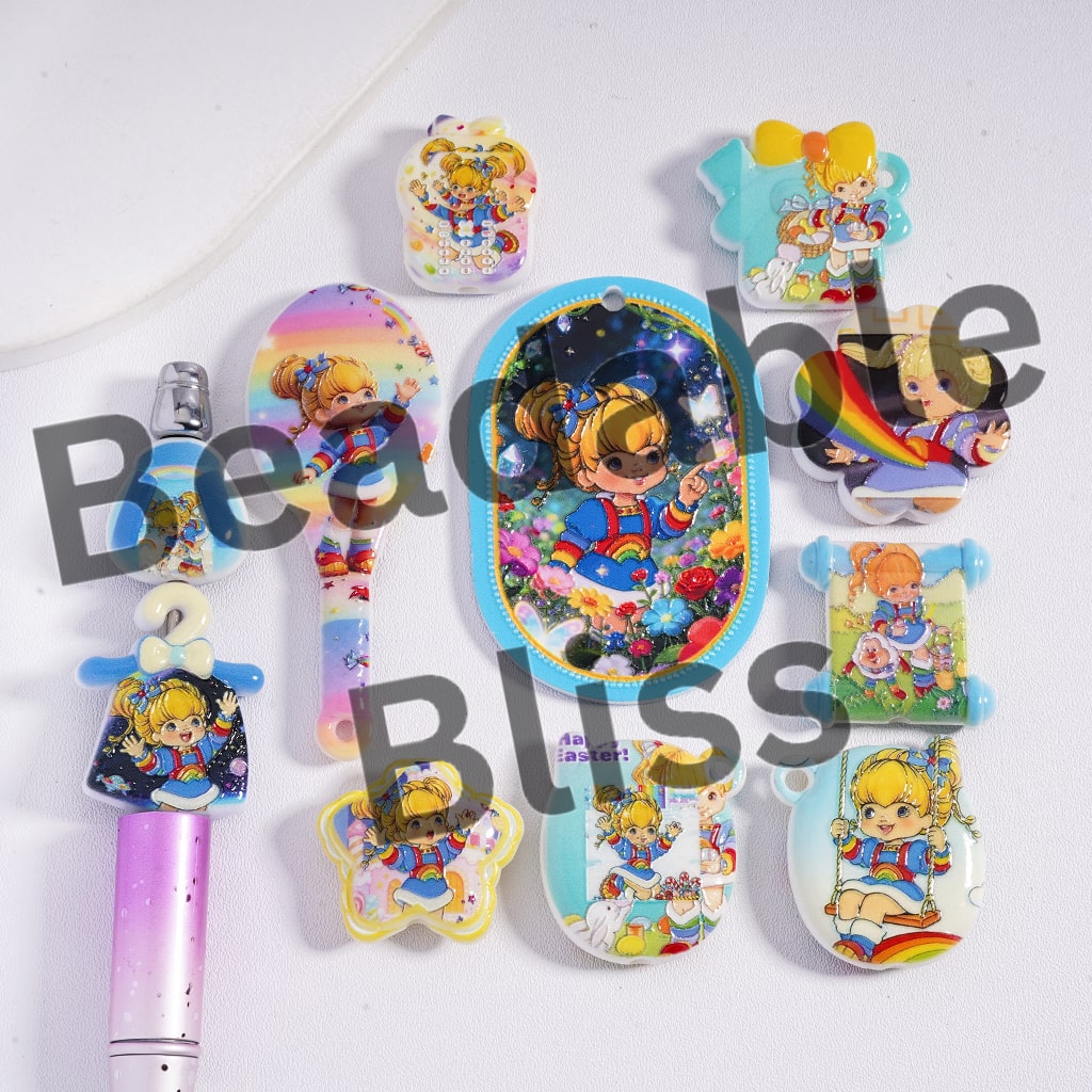 Set of colorful stationery items with cartoon character design on a white background