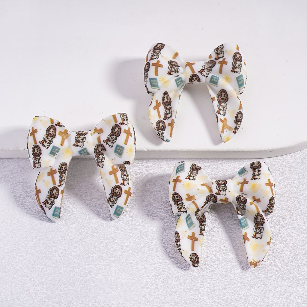 Three decorative bows with a pattern of dogs on a white background