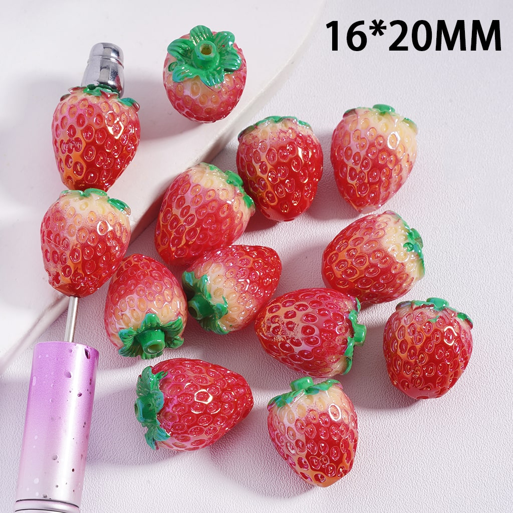 Strawberry-shaped beads with a white tool on a light pink background, labeled '16*20MM'.