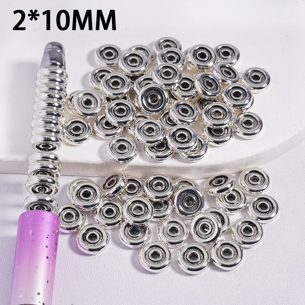 Metal bearings with a tool on a white background, labeled '2*10MM'.