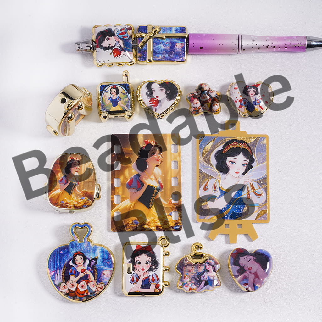 Collection of Snow White-themed jewelry and accessories on a white background.