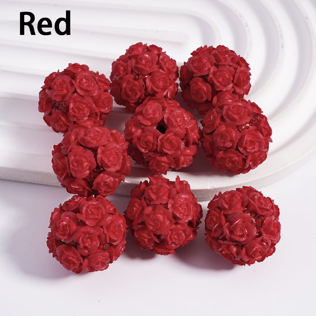 Red rose-shaped beads on a white background