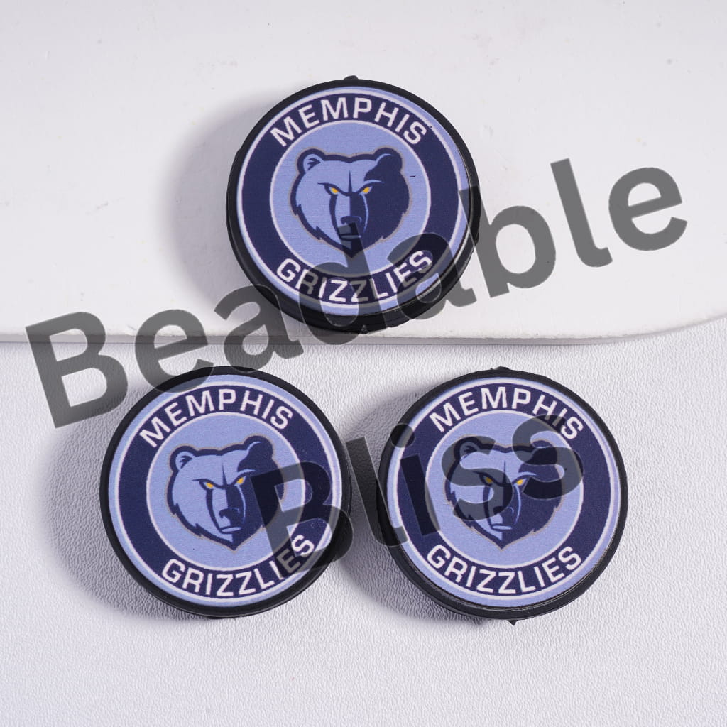 Three Memphis Grizzlies logo coasters on a white background with 'handsome supply.' branding.