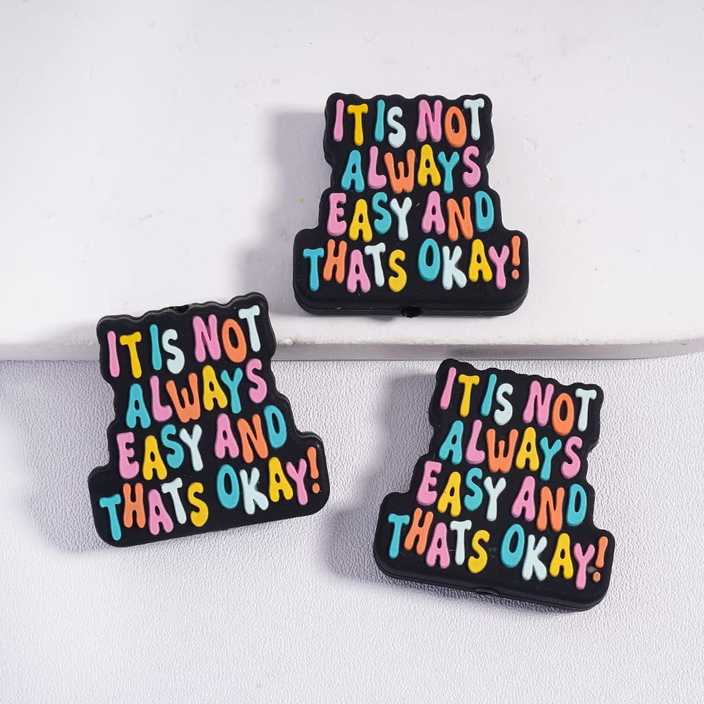 Silicone Focal Beads with Text "IT IS NOT ALWAYS EASY AND THATS OKAY !" on Black Background