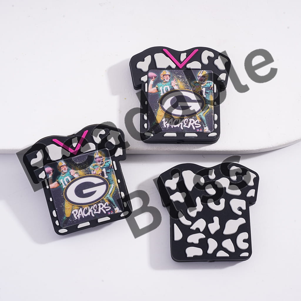 Three decorative items with a Packers logo on a white background