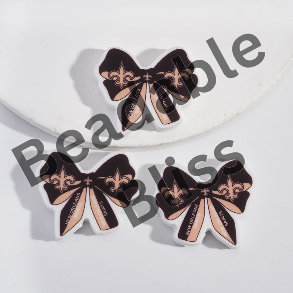 Silicone Focal Beads Bow Tie Shape with NOLA Football Pattern