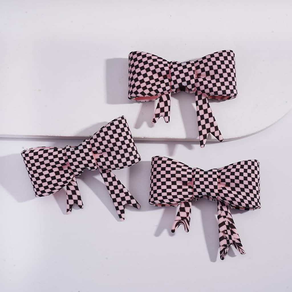Checkered bows on a white background