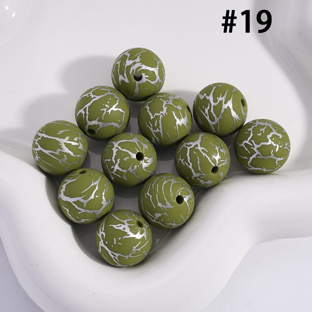 Green marbled beads on a white background