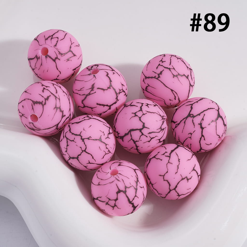 Pink marbled beads on a white surface with the number 89 in the corner.