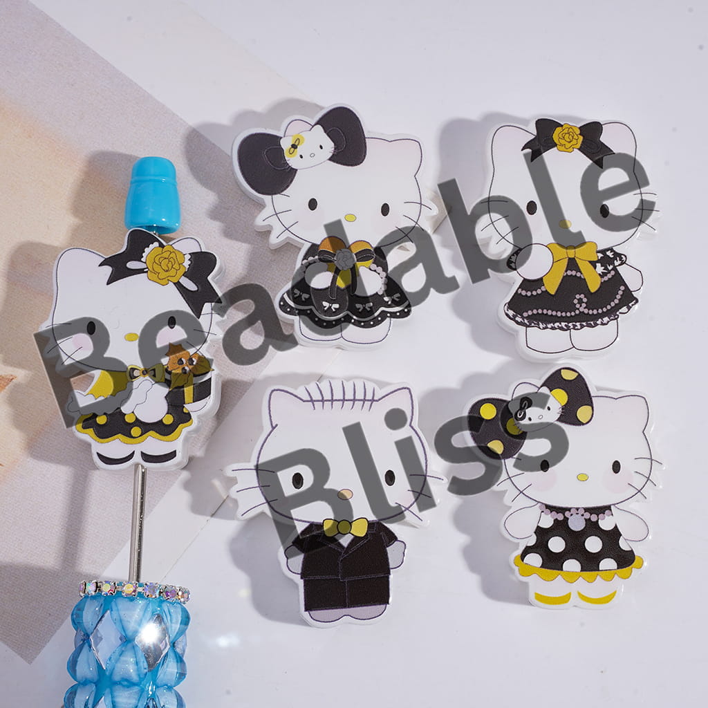 Set of Hello Kitty figurines in formal attire on a white background with 'hansonsupply.com' branding.