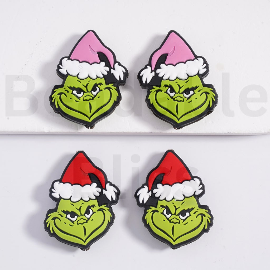 赤いクリスマス帽子のシリコーン焦点ビーズと漫画の緑のモンスター