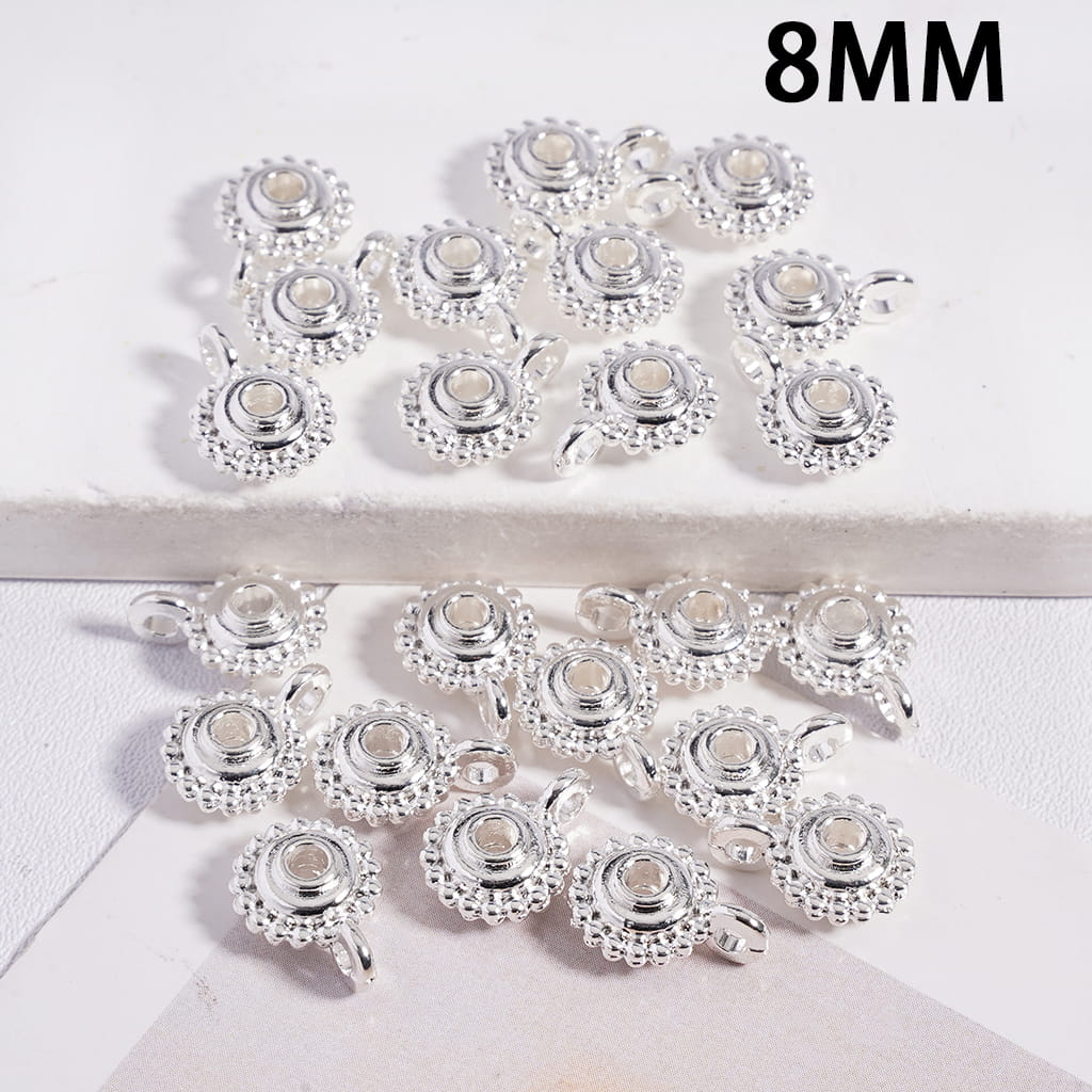 Silver jewelry components with decorative patterns on a white background, labeled '8MM'.