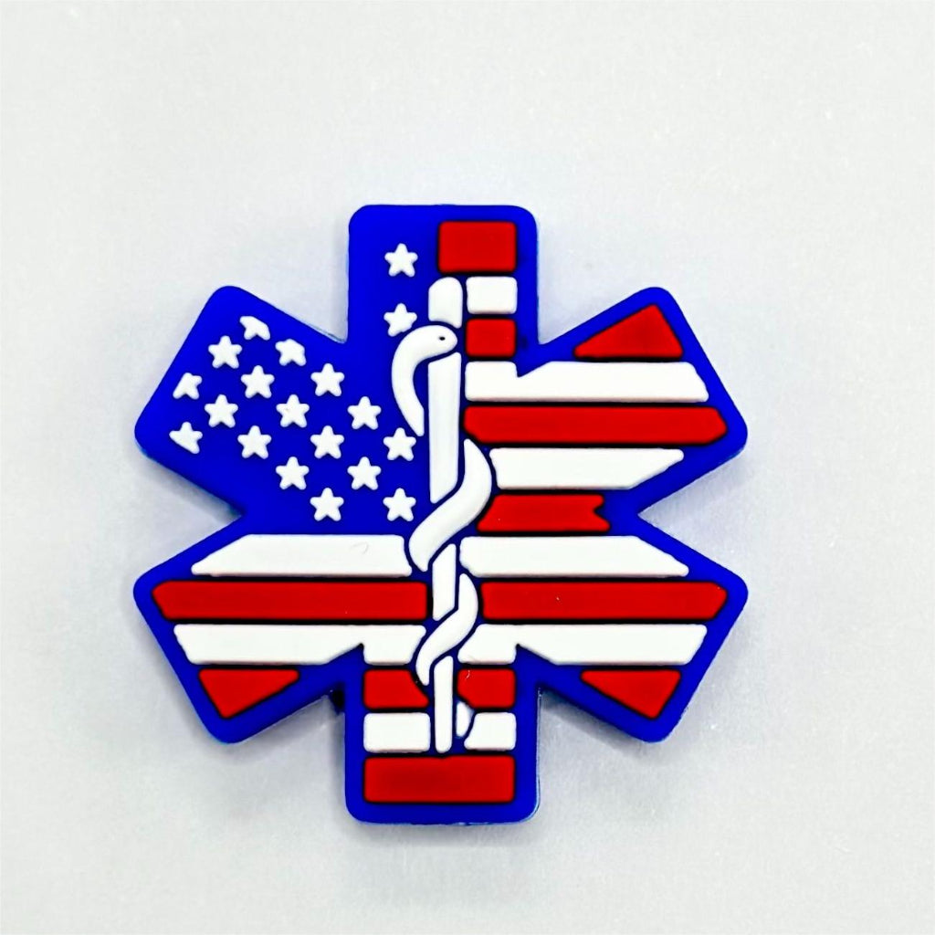 A silicone bead featuring the American flag design with a medical symbol and stars.