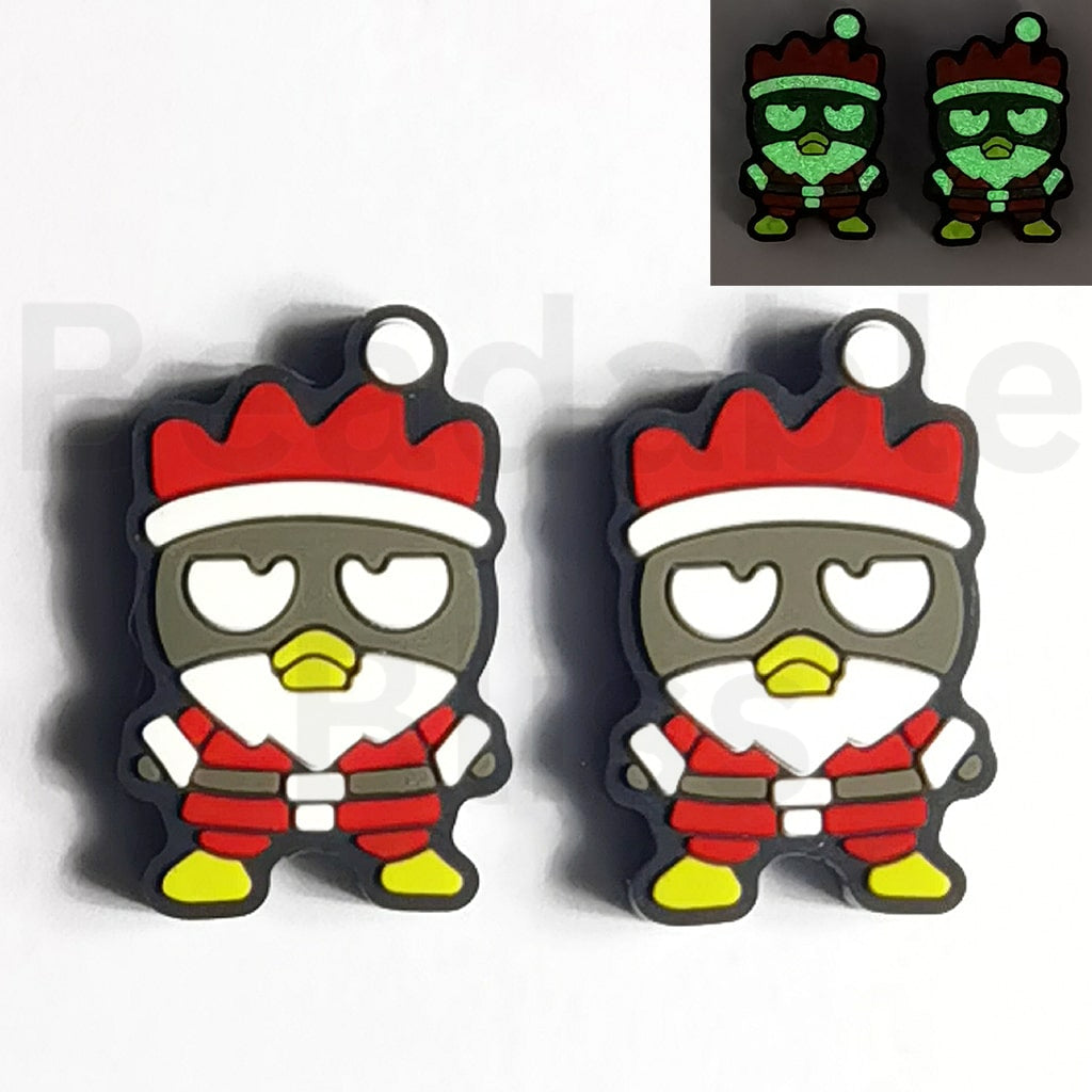 Two cartoon character charms with a red hat and gray face on a white background.
