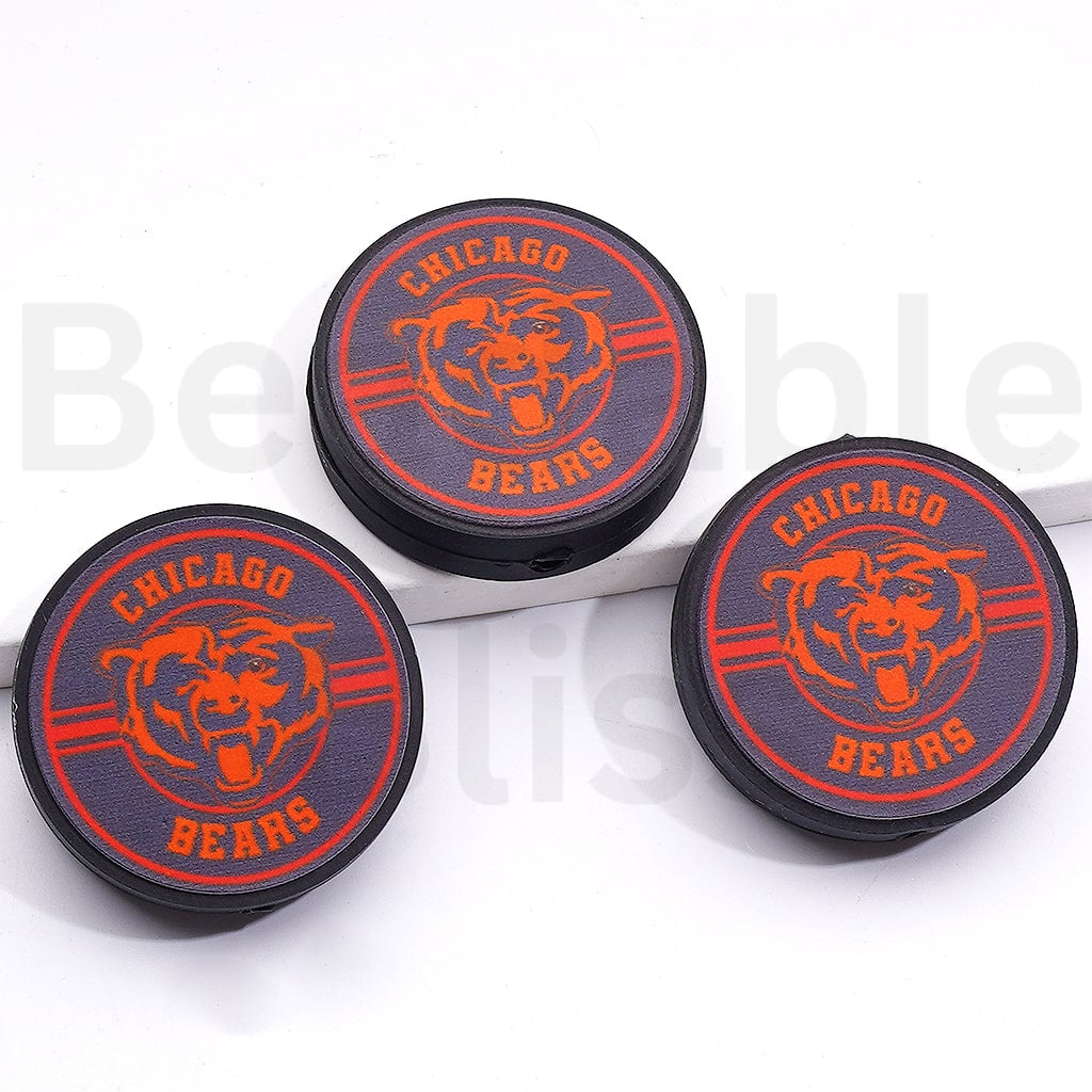Three Chicago Bears logo coasters on a white background