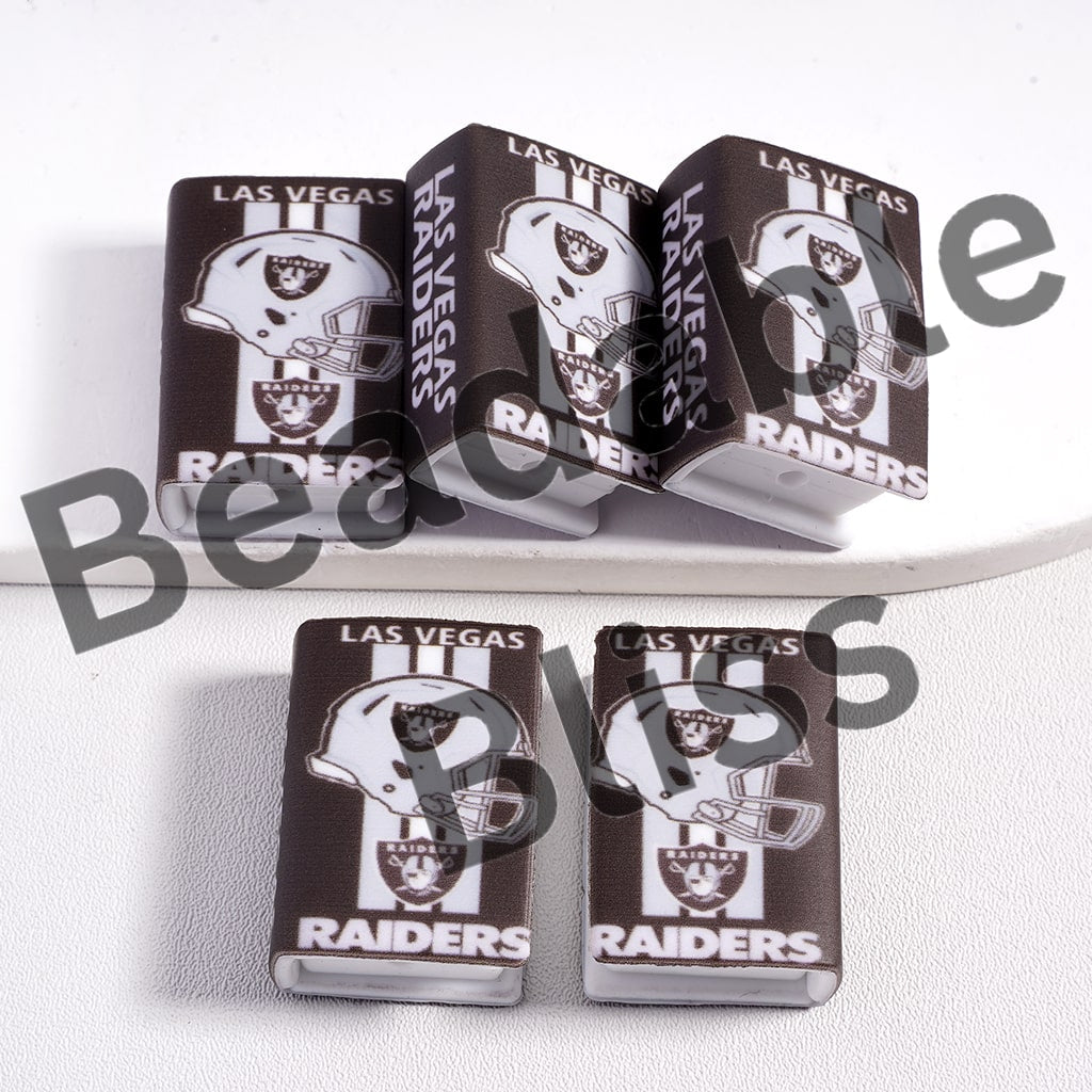 Las Vegas Raiders coasters on a white surface with 'beadablebliss' branding.