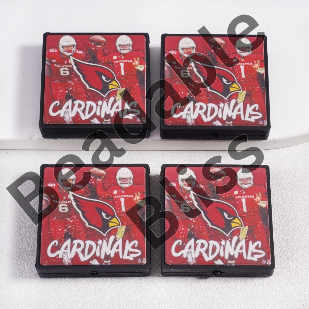 Four Arizona Cardinals-themed coasters on a white background