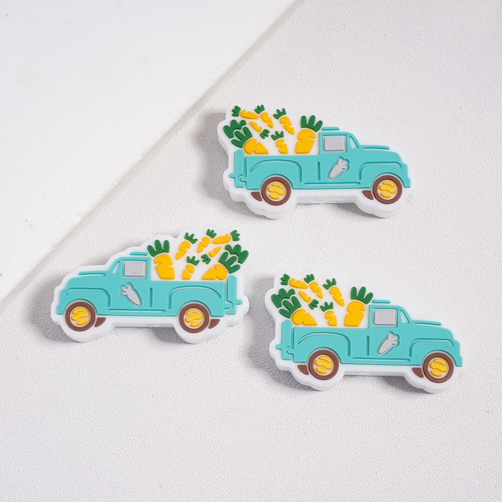 Three turquoise trucks with cargo on a white background