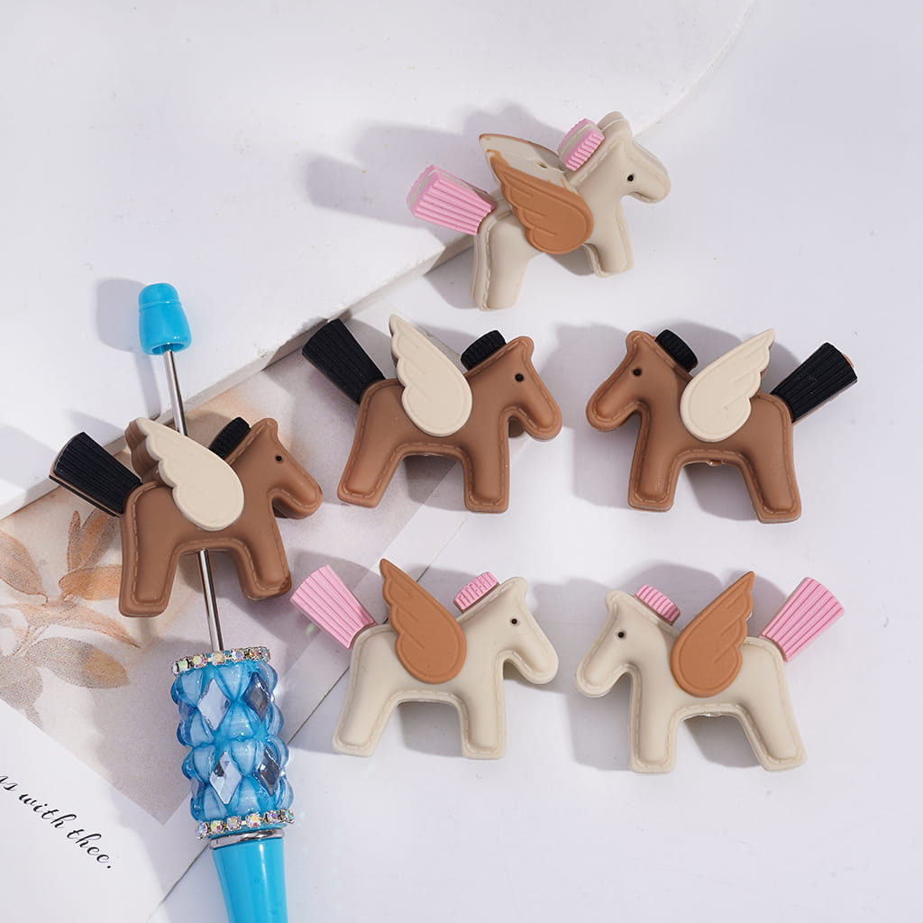 Set of horse-shaped clips with a blue handle on a white background