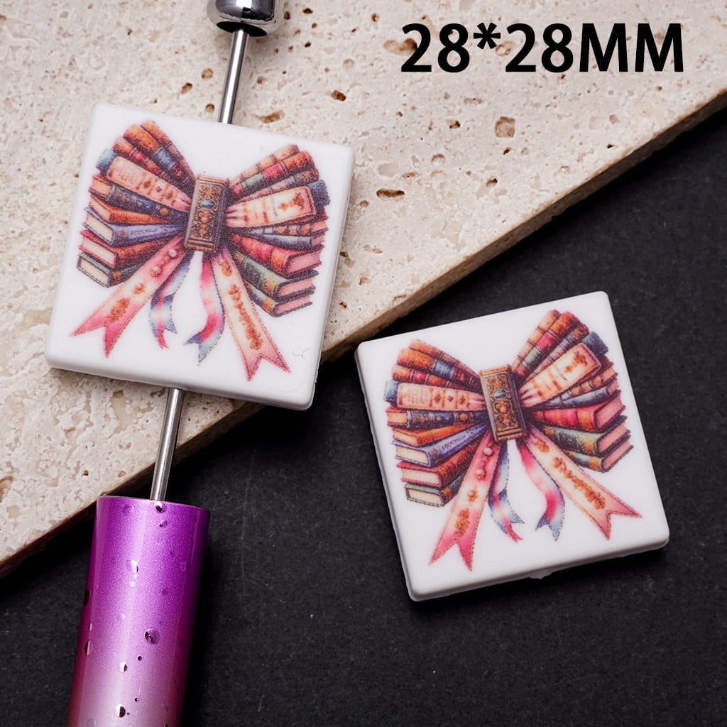 Silicone Focal Beads with Bowtie Made Up of Closed Books Prints, Flat Square Shape