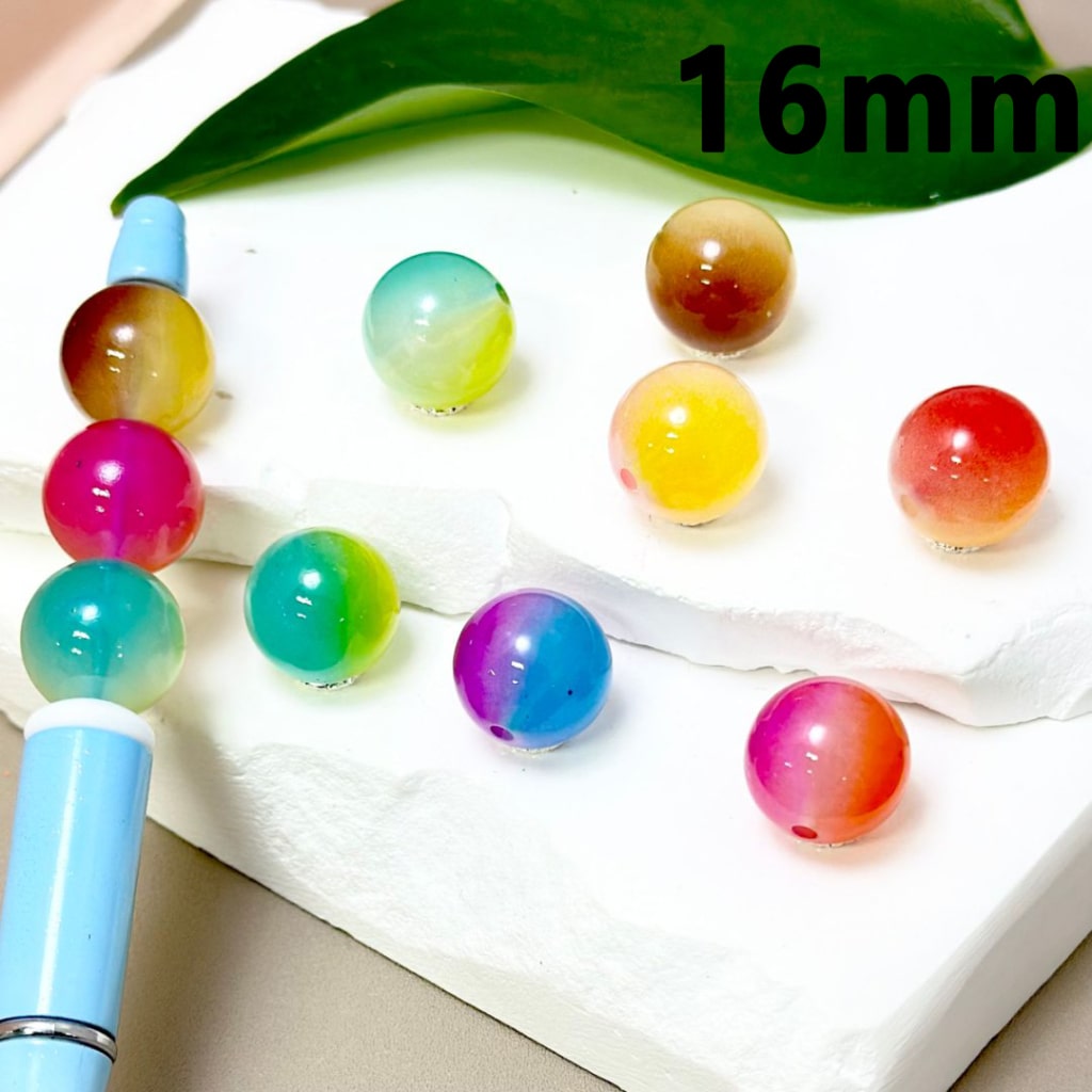 Colorful beads on a white surface with a green leaf and '16mm' text.