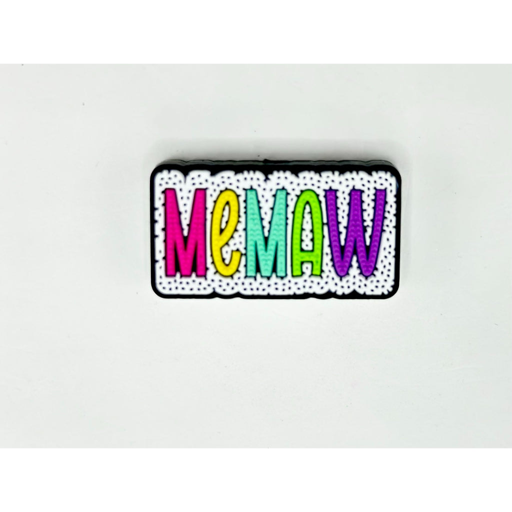 A rectangular silicone bead with the text 'MEMAW' written in colorful letters.