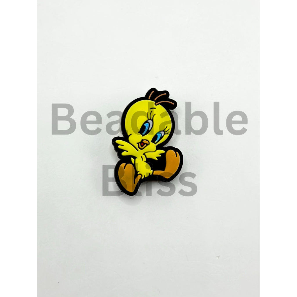 Cartoon character on a white background with ' beadablebliss' branding.