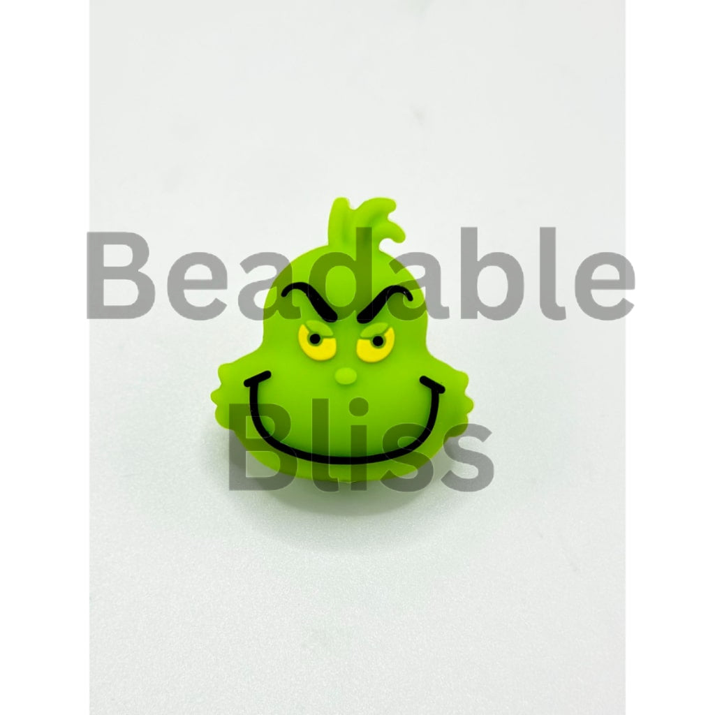 Green character with a grumpy expression on a white background