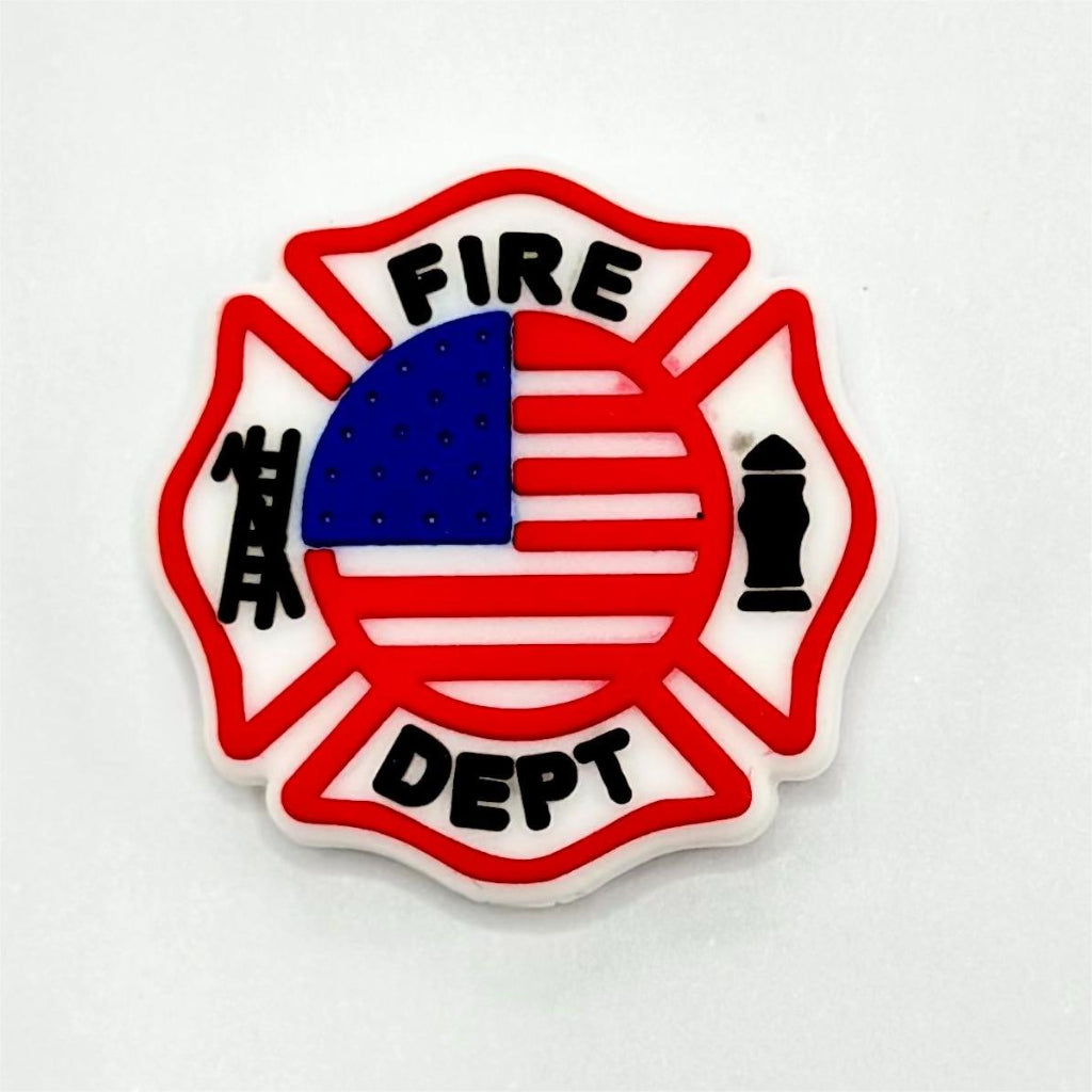 A silicone focal bead featuring the USA America Fire Department logo with a red and blue design and an American flag.