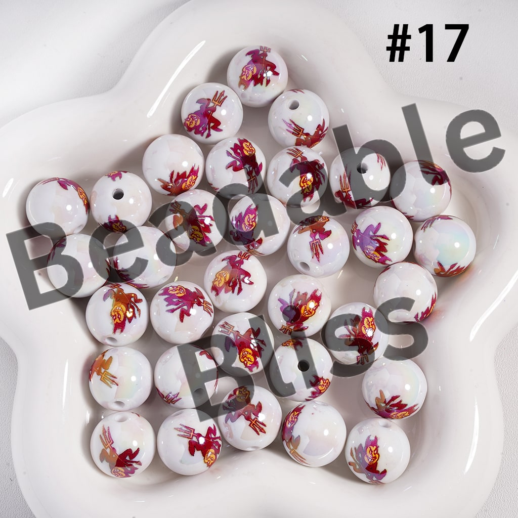 White beads with colorful designs on a white plate, labeled 'Beadable Blush'.