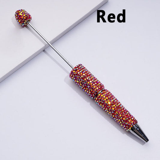 A selection of solid color beadable clay pens fully covered in AB rhinestones, displayed in a variety of colors.

