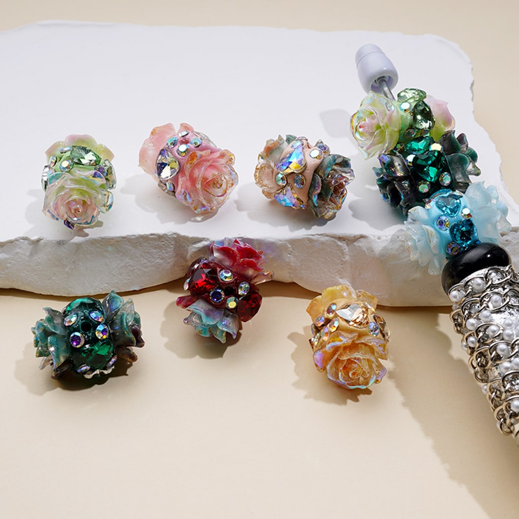 Bling bling shiny flower-shaped clay bead with AB rhinestones in a clear heart diamond design, approximately 18×15mm, random mix for jewelry and craft projects.