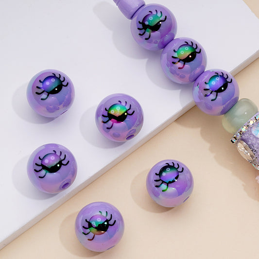 紫色のUVコーティングを施した小さな黒い蜘蛛のプリントのアクリルビーズ、16mm