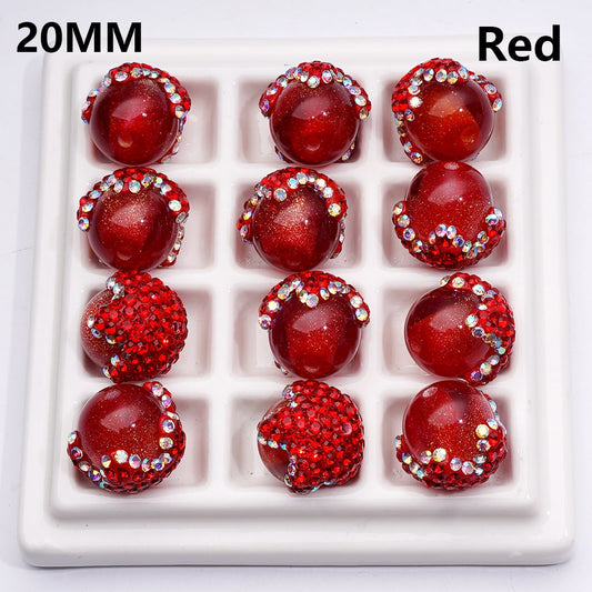 Red gemstones with rhinestones on a white tray, labeled '20MM' and 'Red'.