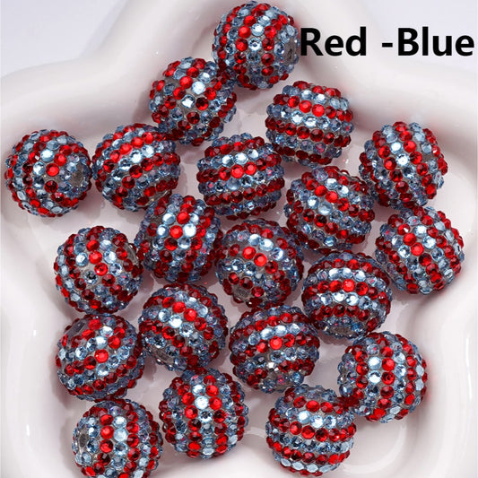 Red and blue beaded balls on a white background

