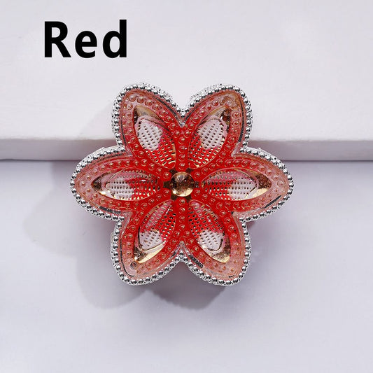A collection of silver-colored alloy flower beads with vibrant rhinestones in various colors including pink, blue, green, and purple.

